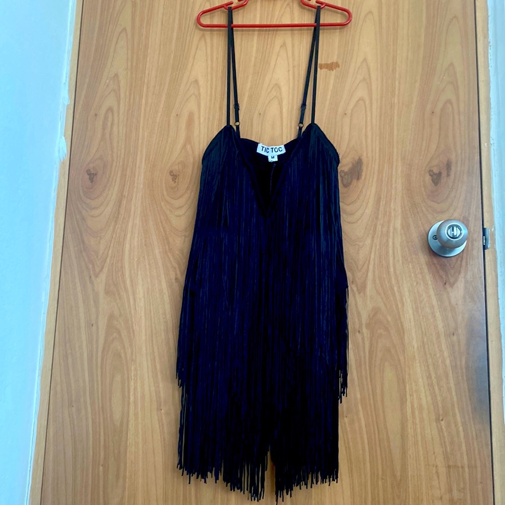 Fringe body suit . never used